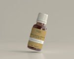 Floating Golden Aura 15ml essential oil bottle. Online Golden Aura oils for a bright, sunny aromatherapy vibe.